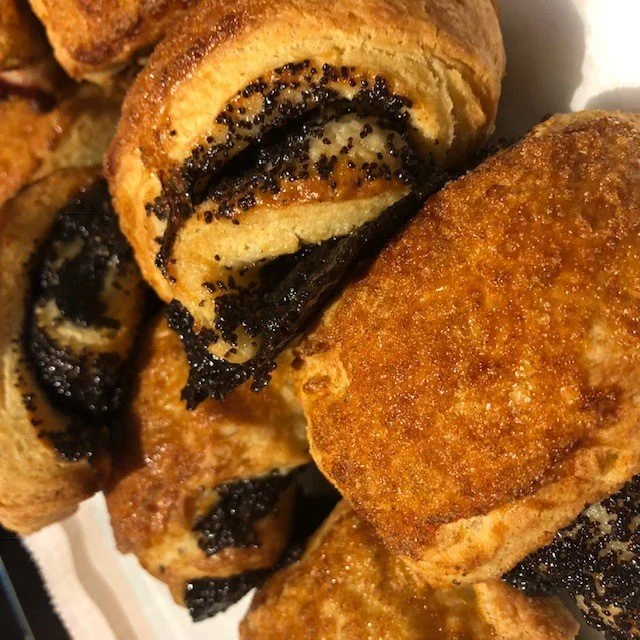Russian Tea biscuits filled with  poppy seed filling or walnuts, golden raisins, and fruit filling.