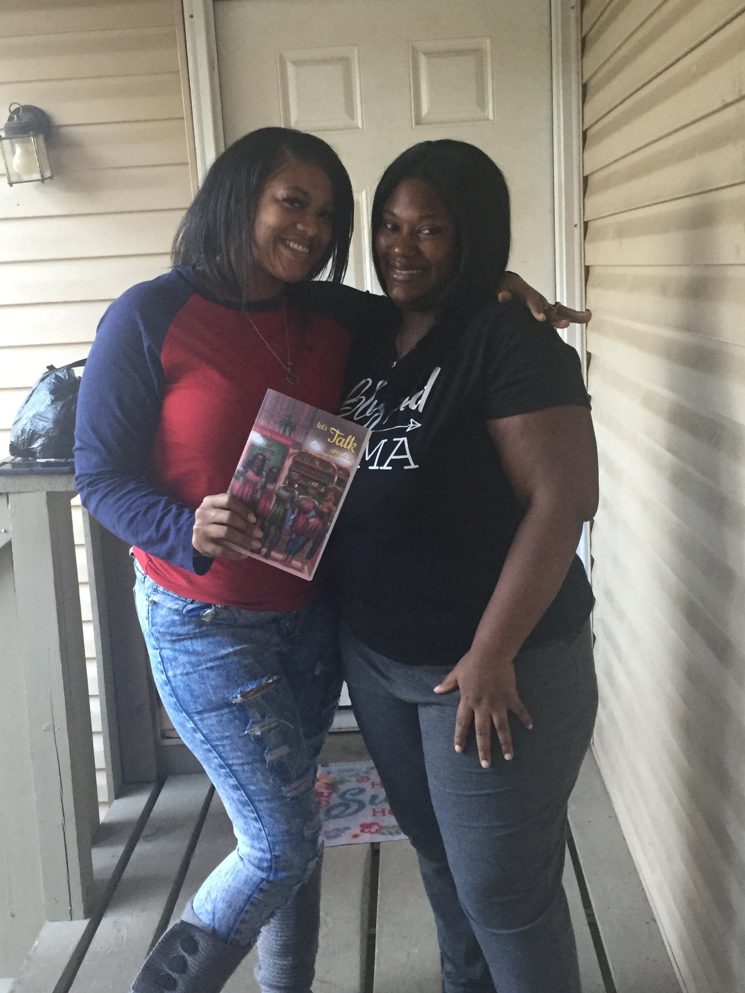 Look Who's Reading!!!  My good friend T. She came to check on our CEO after discovering she had the baby early and she purchased a book. God is Good!  