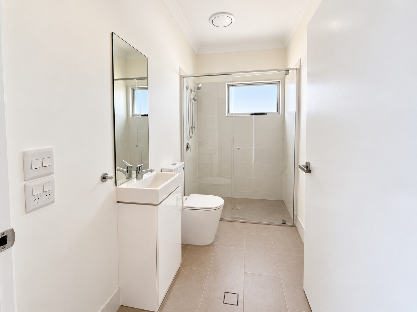 Bright Minimalist Modern Bathroom.png