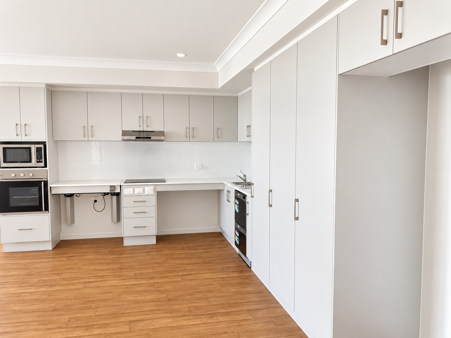Bright Minimalist White Kitchen.png