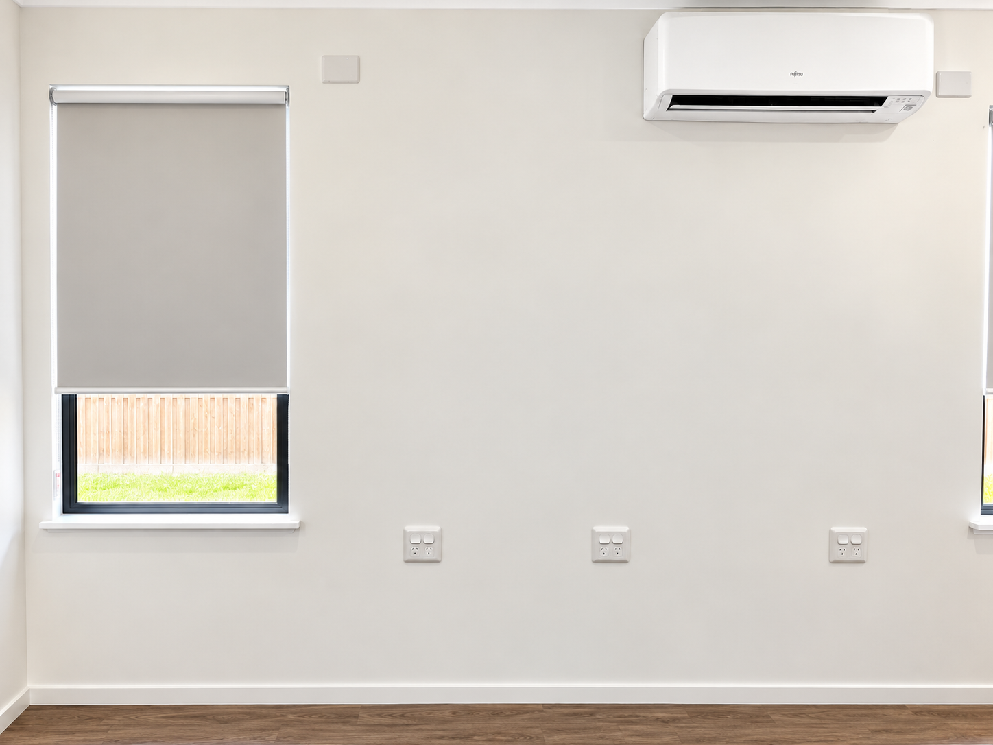 Minimal Modern Room with Air Conditioner and Windows.png