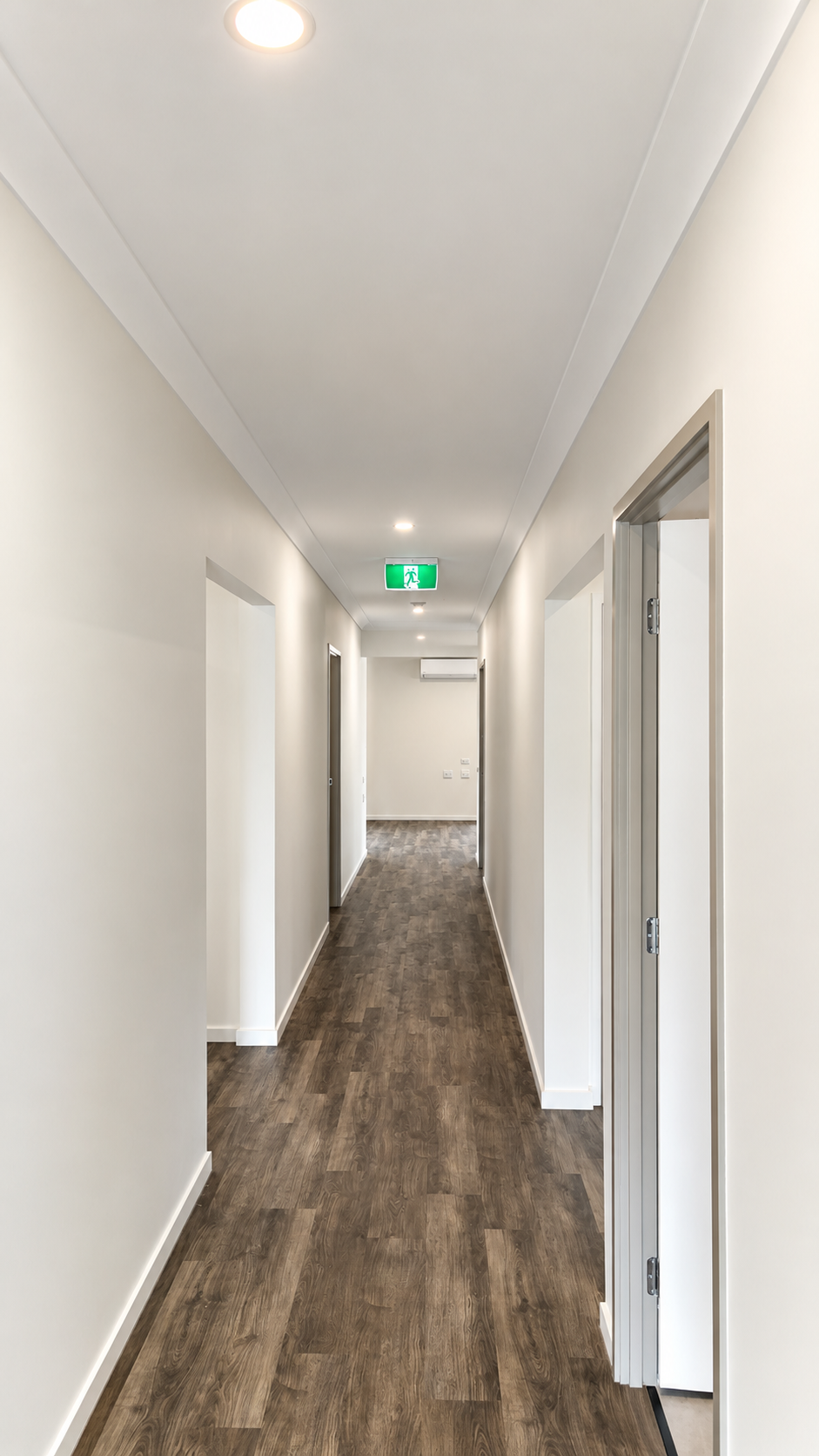 Modern Hallway with Exit Sign.png