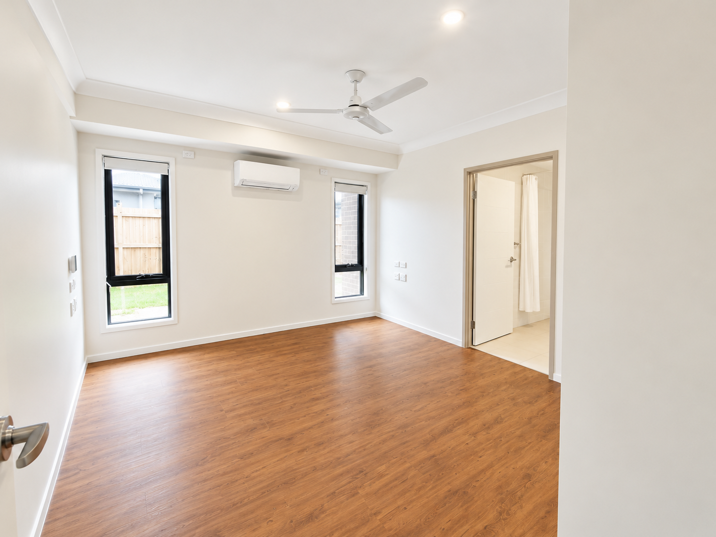 Bright Minimalist Bedroom Interior (1).png