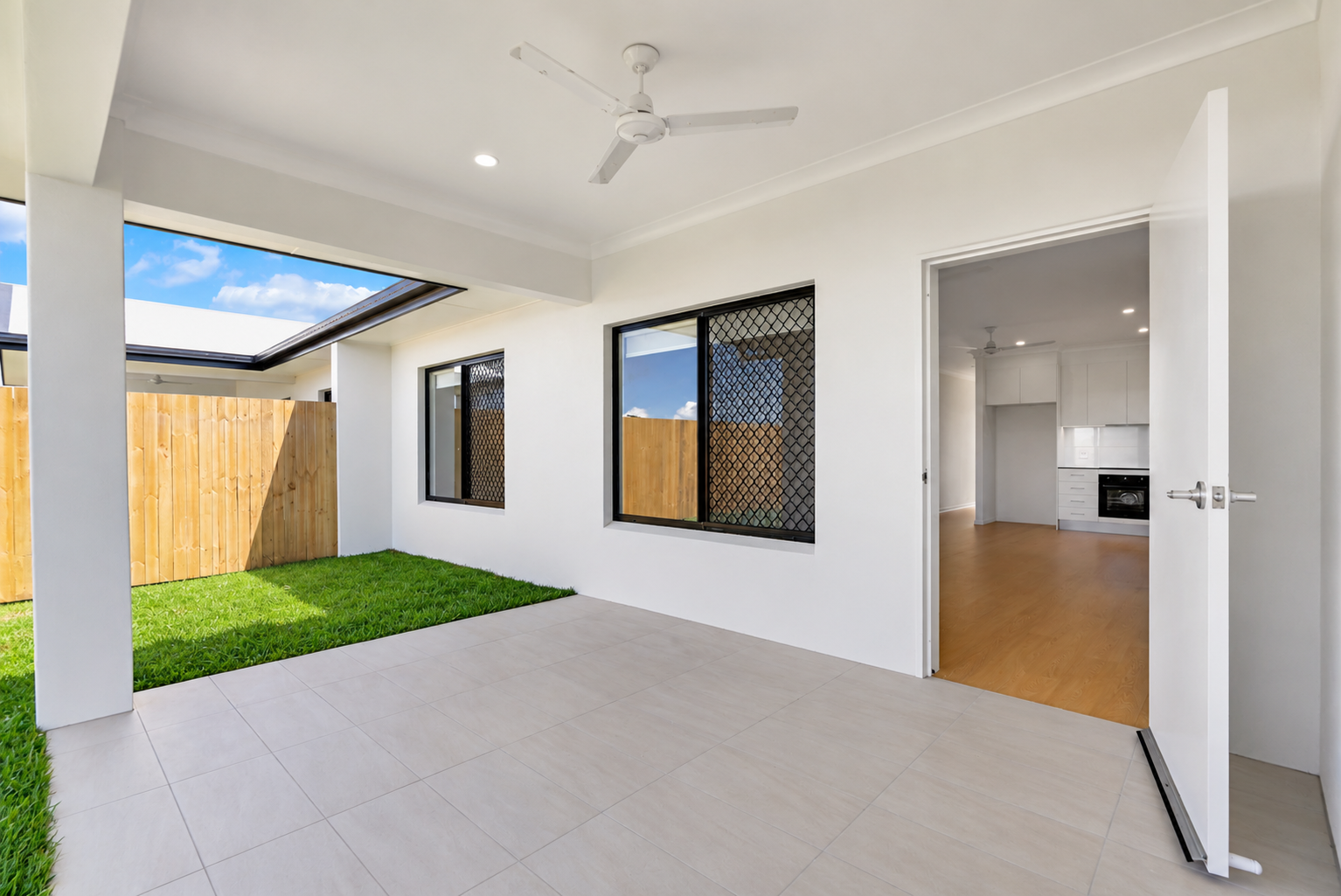 Modern Covered Patio with Open Kitchen View.png