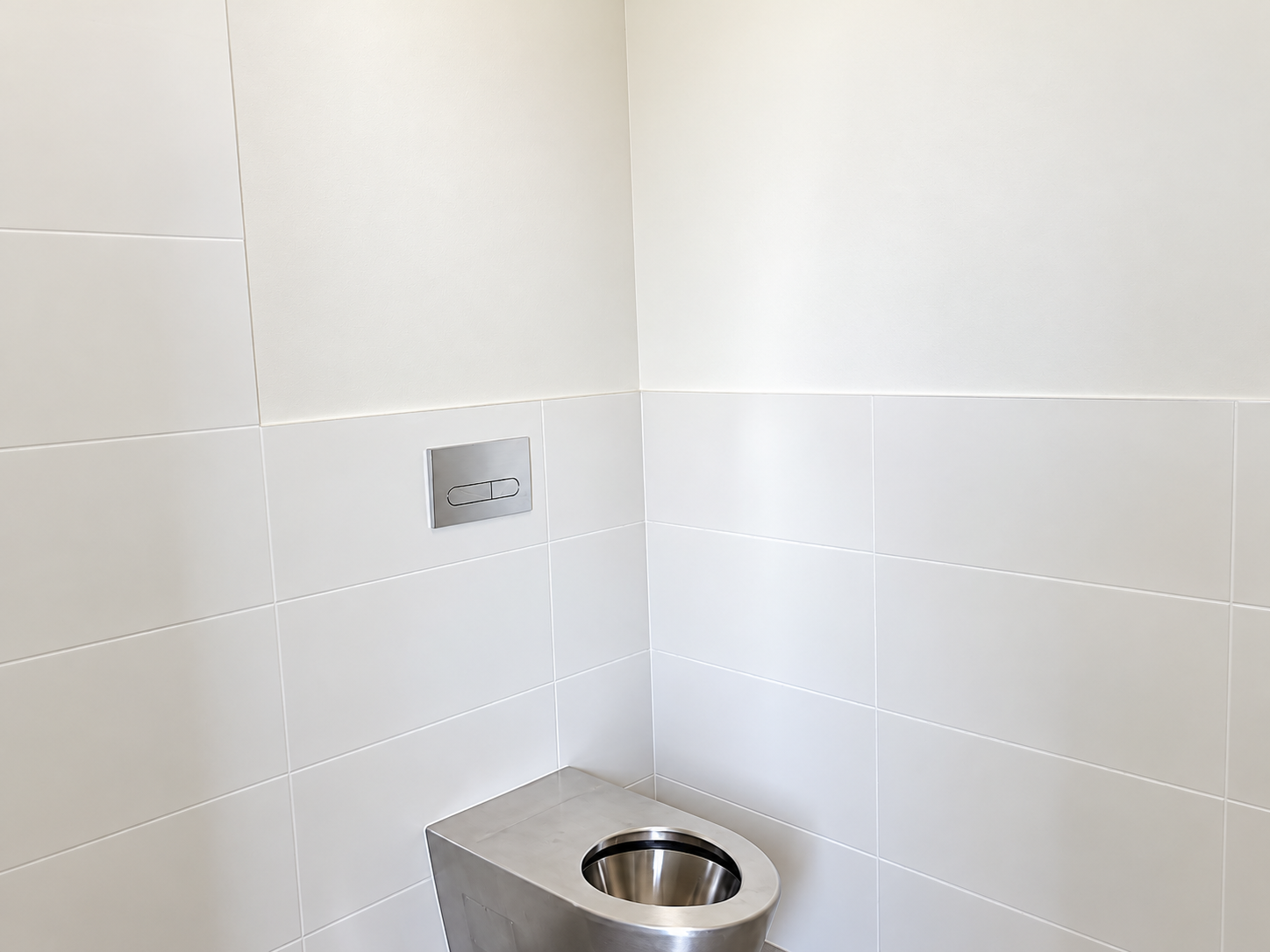 Minimalist Stainless Steel Restroom Corner.png