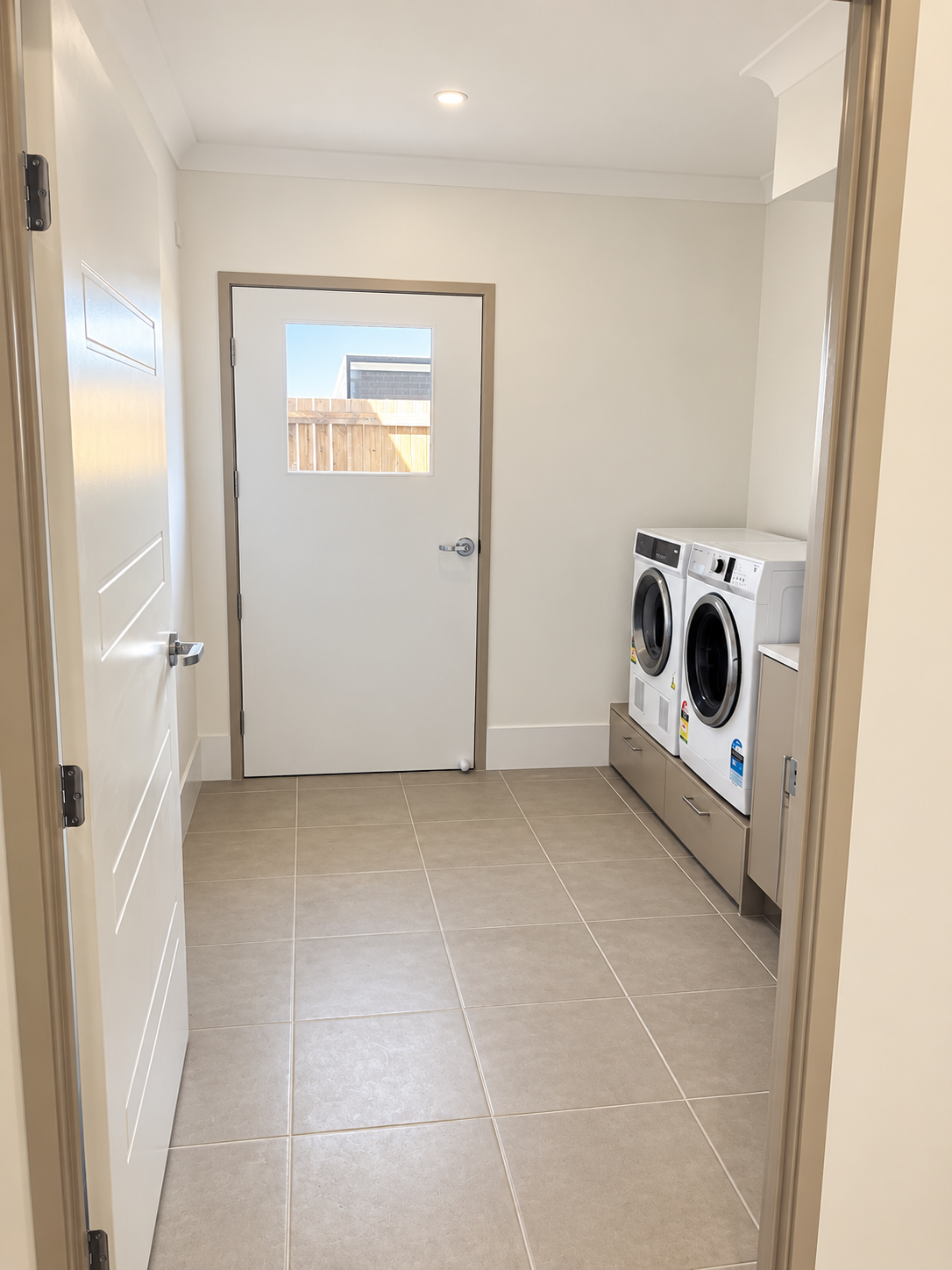 Bright Minimalist Laundry Room.png