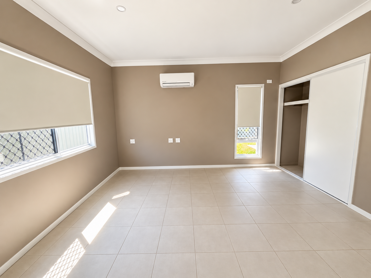 Bright Minimalist Bedroom Interior.png