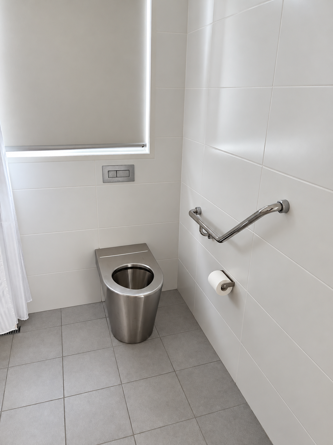 Minimalist Accessible Restroom Interior.png