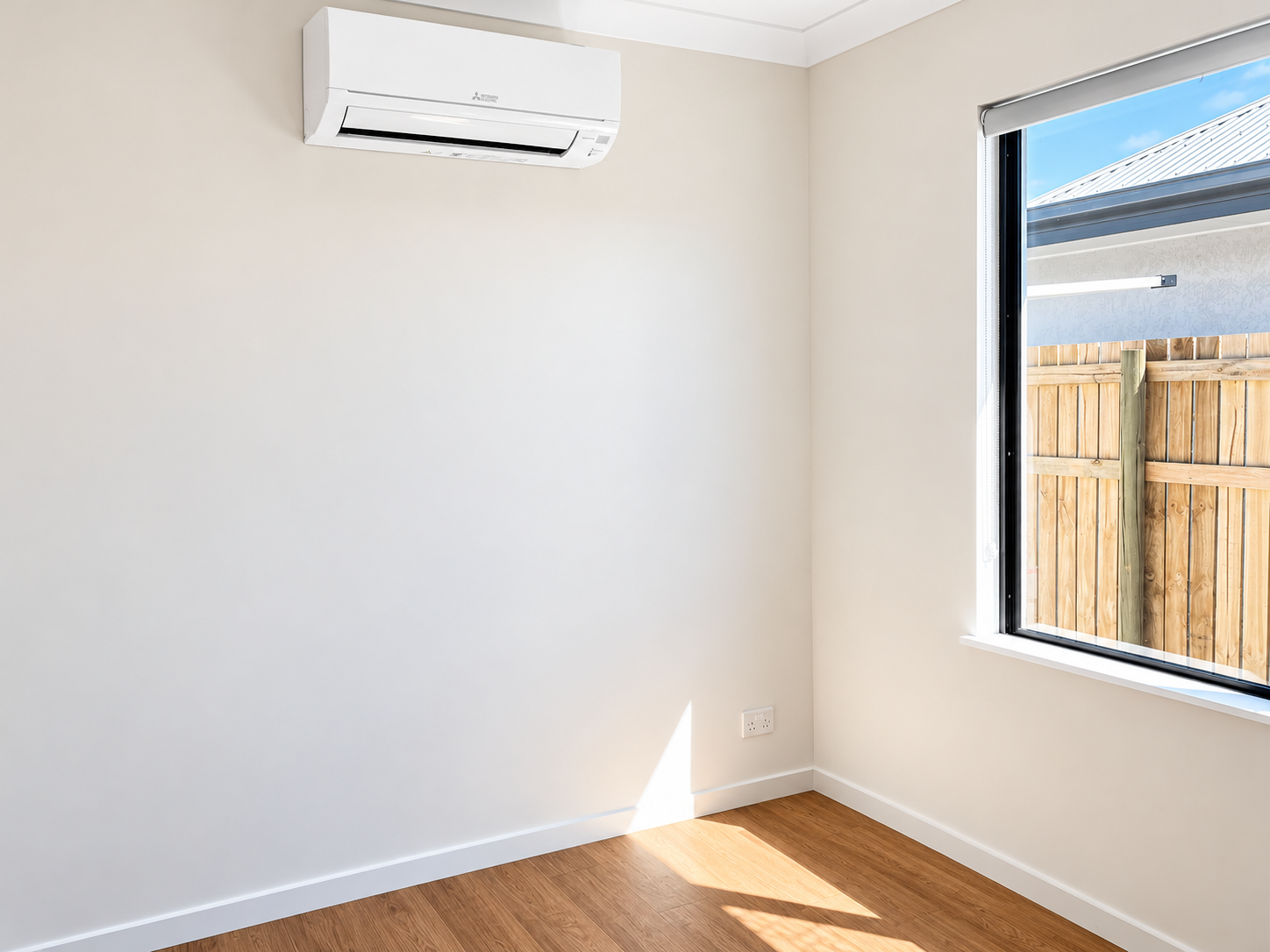 Bright Minimal Room with Air Conditioner and Window.png