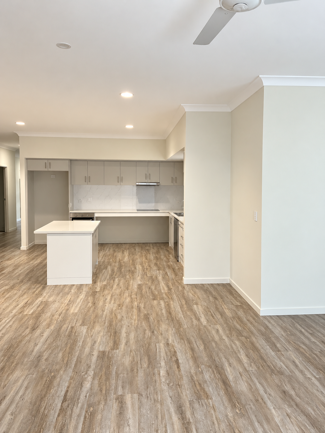 Bright Minimalist Open-Plan Kitchen Interior.png