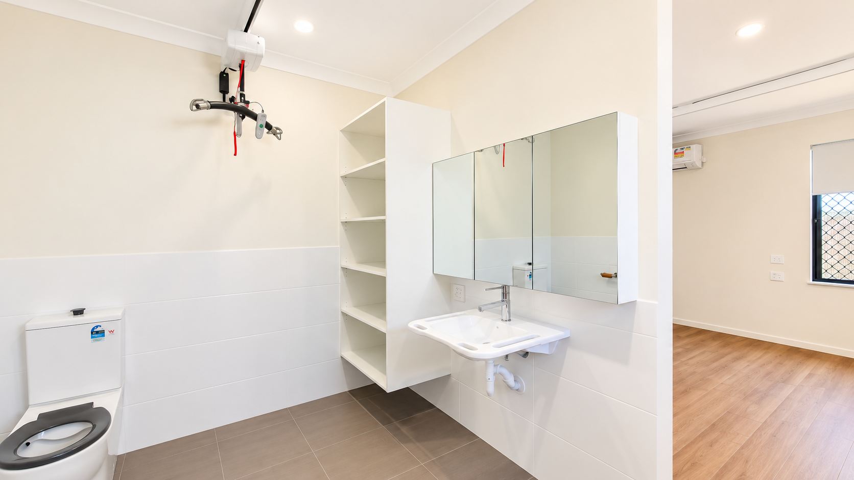 Modern Accessible Bathroom with Ceiling Hoist.png