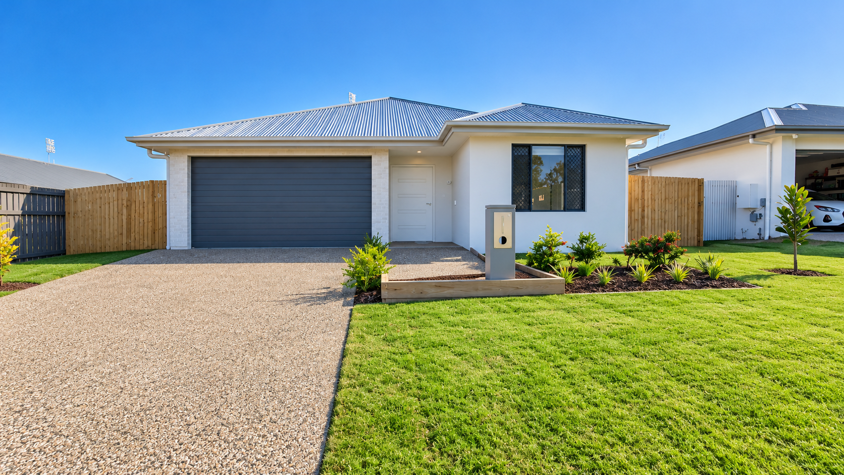 Modern Suburban Home with Lush Landscaping.png