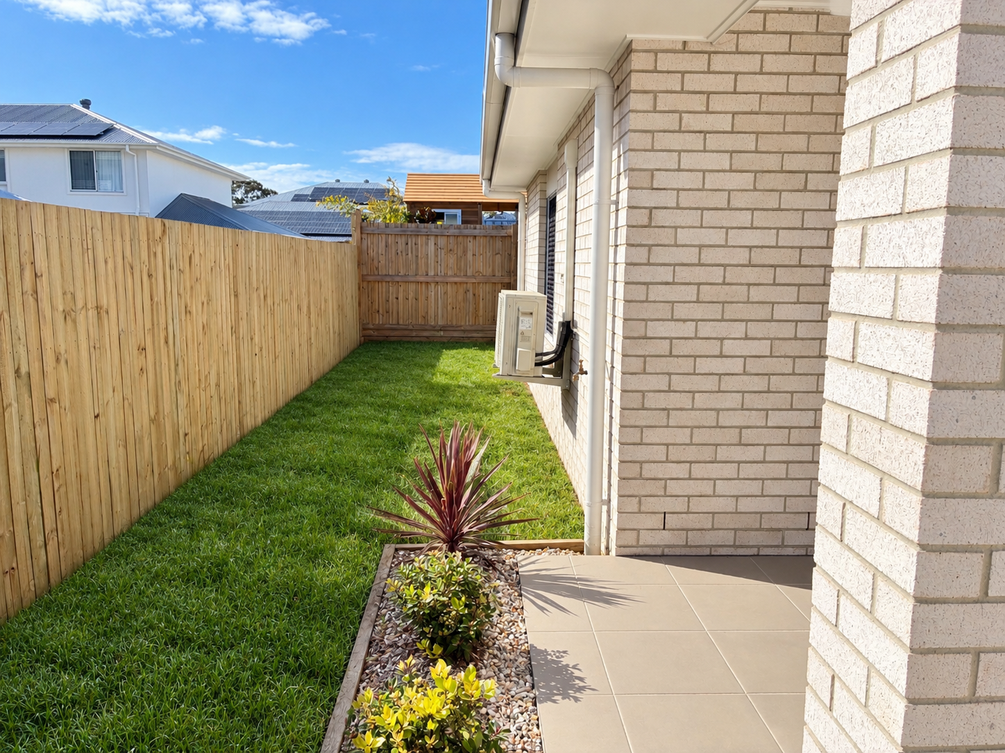 Sunlit Modern Side Yard Passage.png