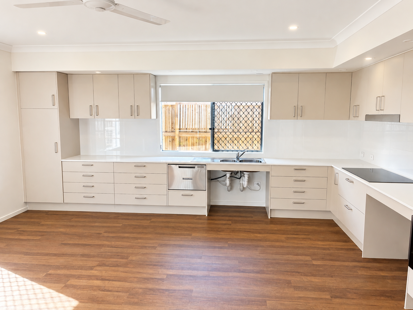 Bright Modern Kitchen with Central Window.png