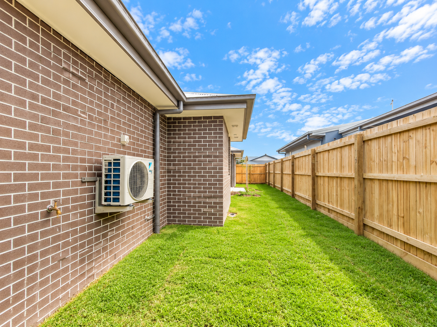 Sunny Brick House Side Yard.png