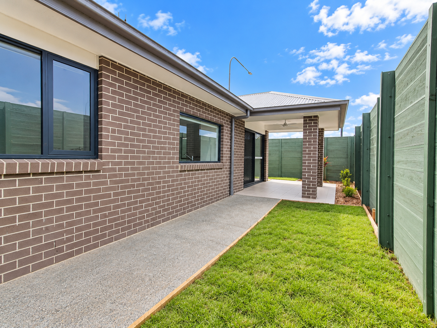 Modern Brick House Side Yard.png