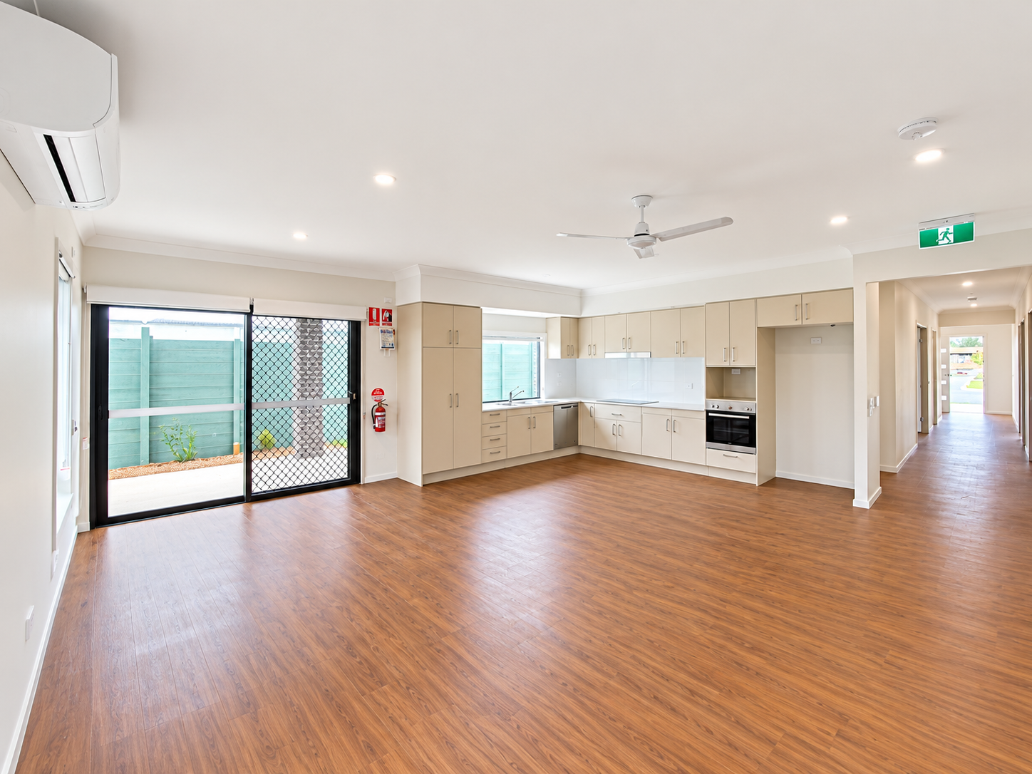 Bright Empty Modern Kitchen and Hallway.png