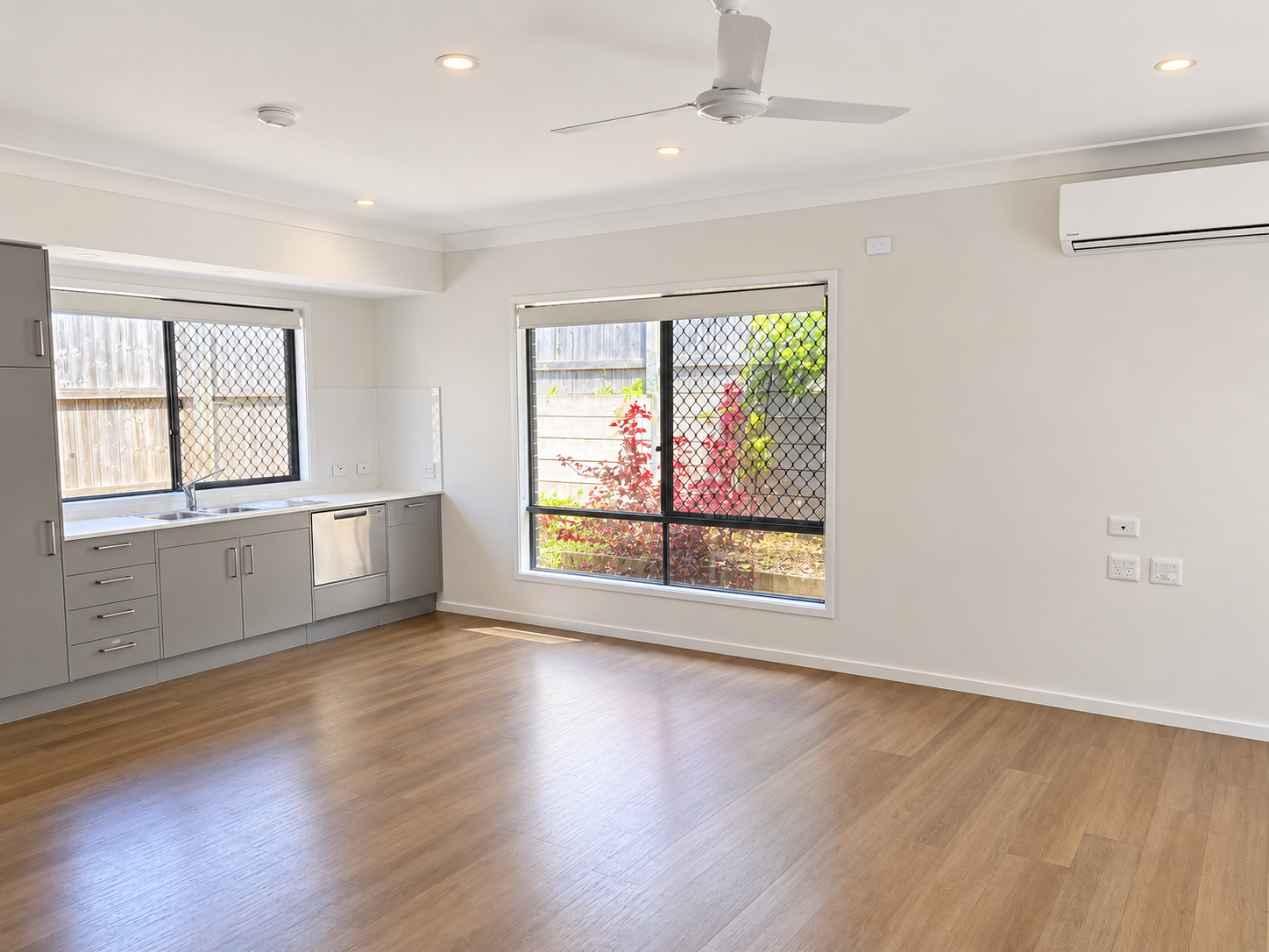 Bright Minimalist Kitchen Living Space.png