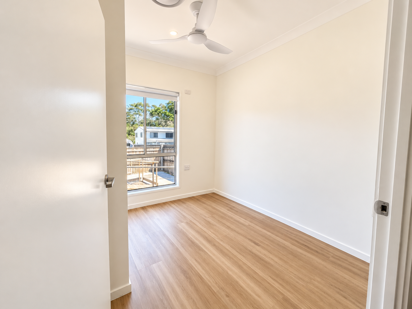 Bright Minimalist Room with Window View.png