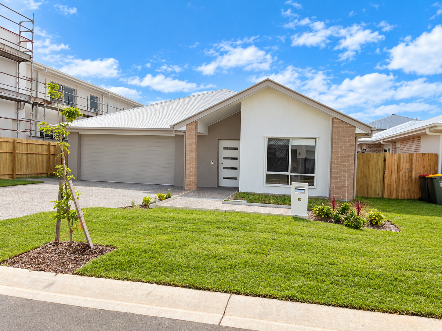 Modern Suburban Home in Sunshine.png