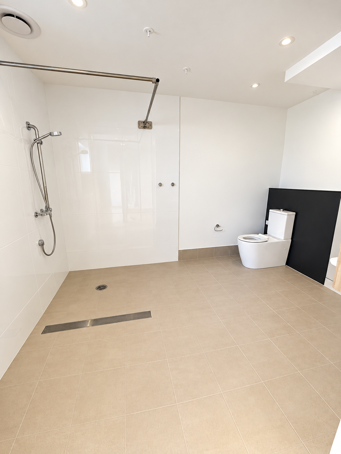 Bright Minimalist Accessible Bathroom.png