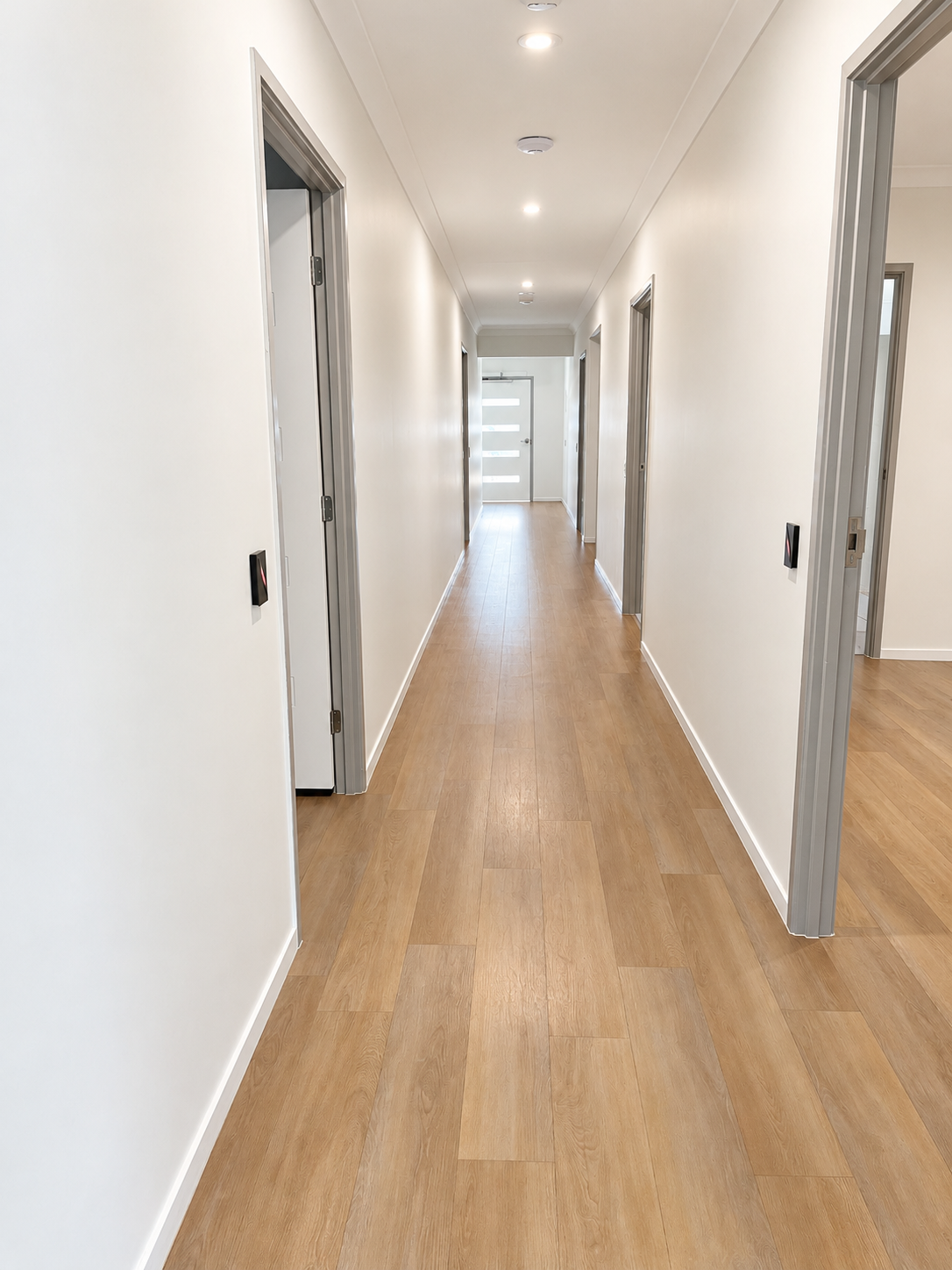 Modern Minimalist Hallway Perspective.png