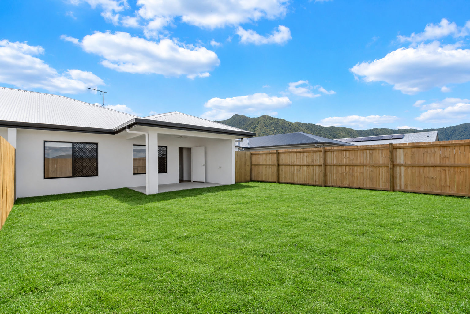 Modern Backyard with Mountain Views.png