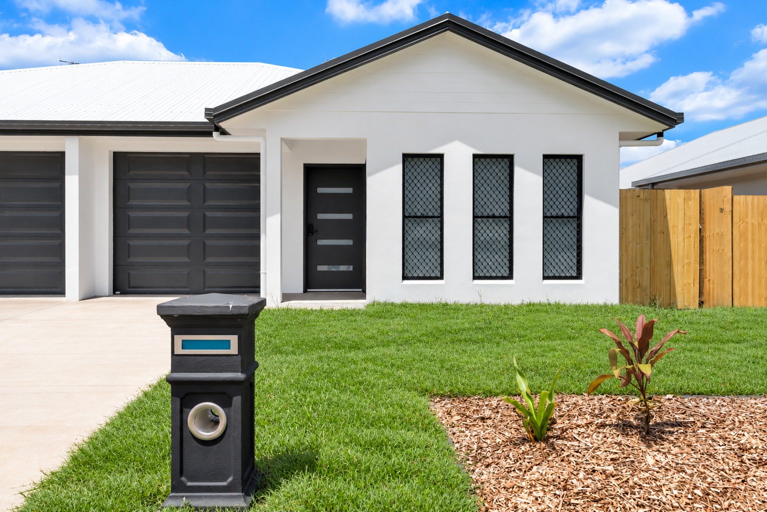 Modern Suburban Home with Tropical Landscaping.png