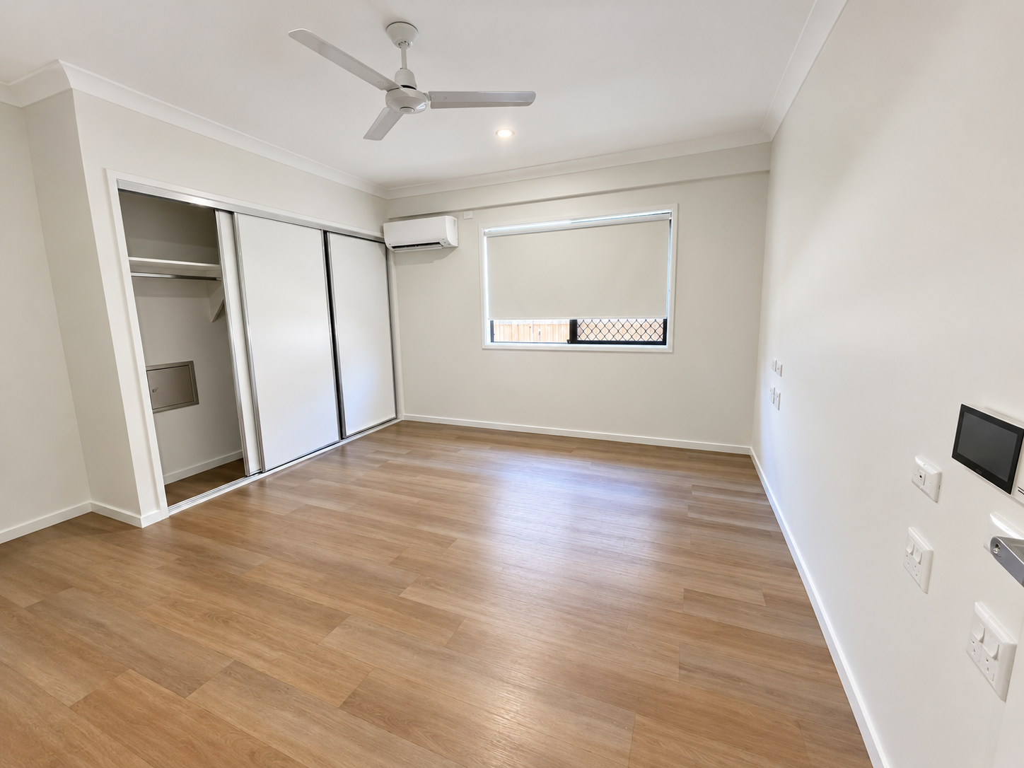 Minimalist Bedroom with Built-In Wardrobe.png