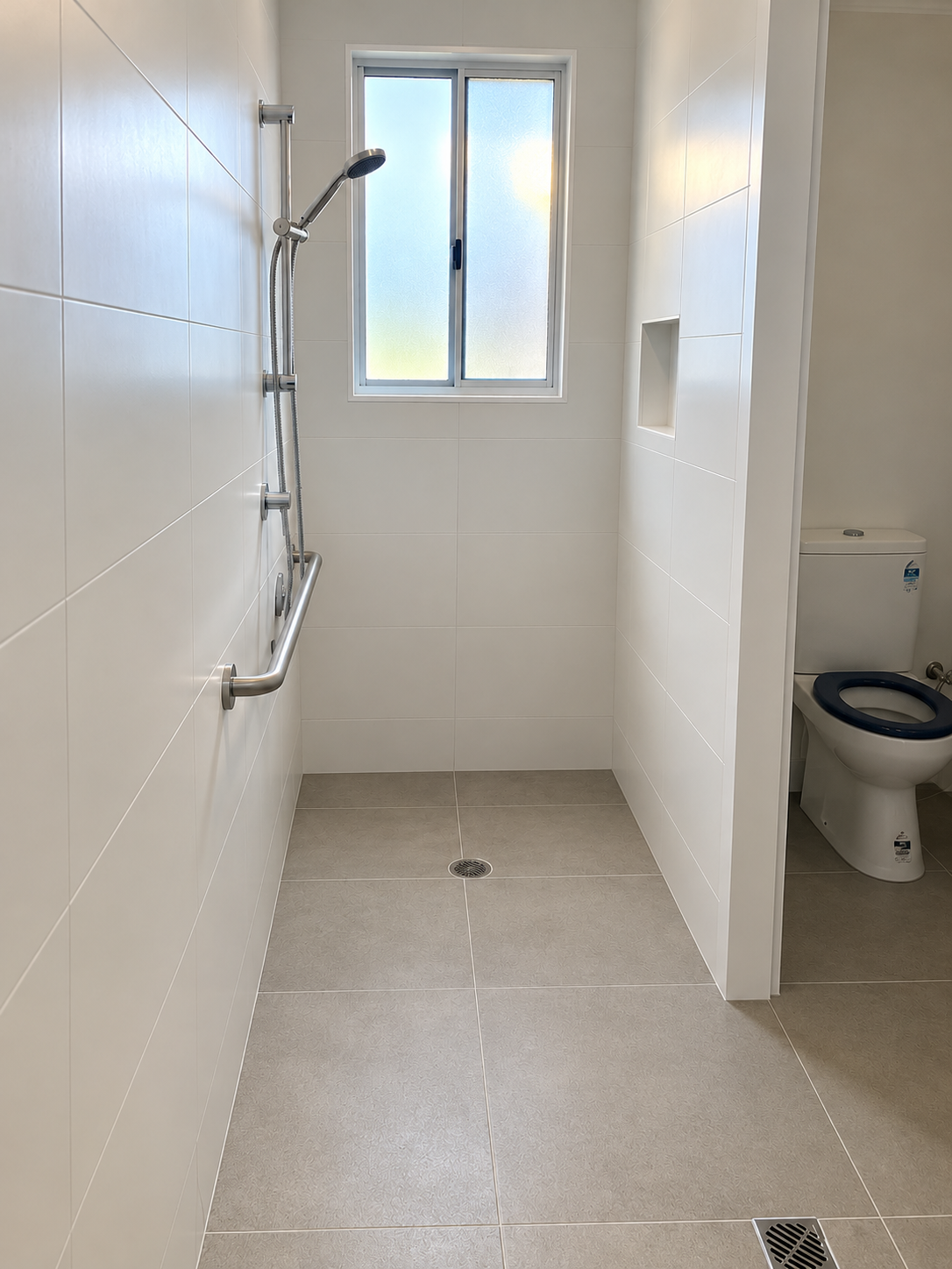 Bright Minimalist Wet-Room Bathroom.png