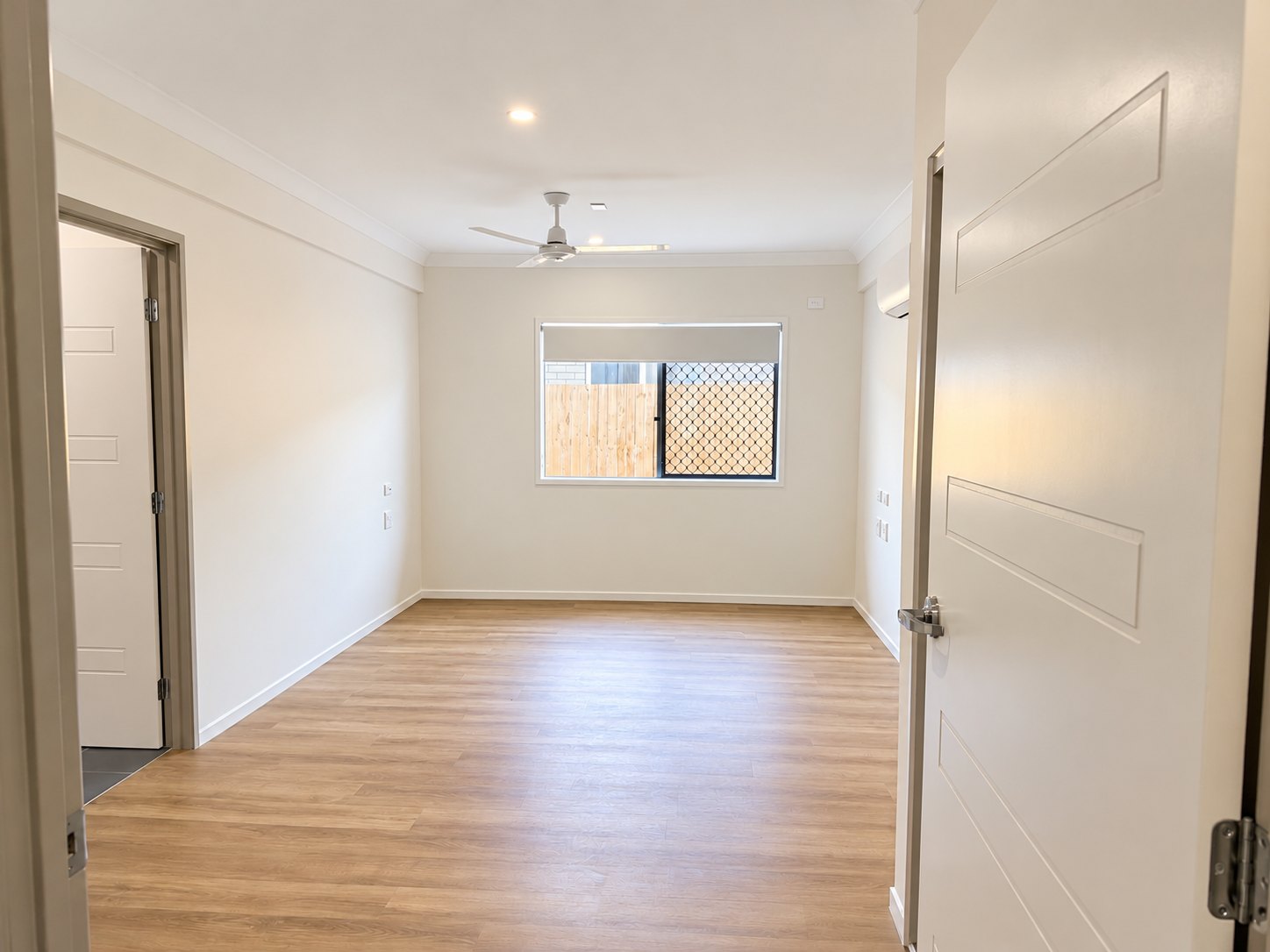 Bright Minimalist Empty Bedroom (1).png