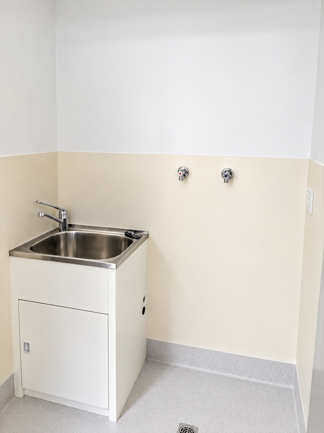 Minimal Utility Room with Laundry Sink and Hookups.png