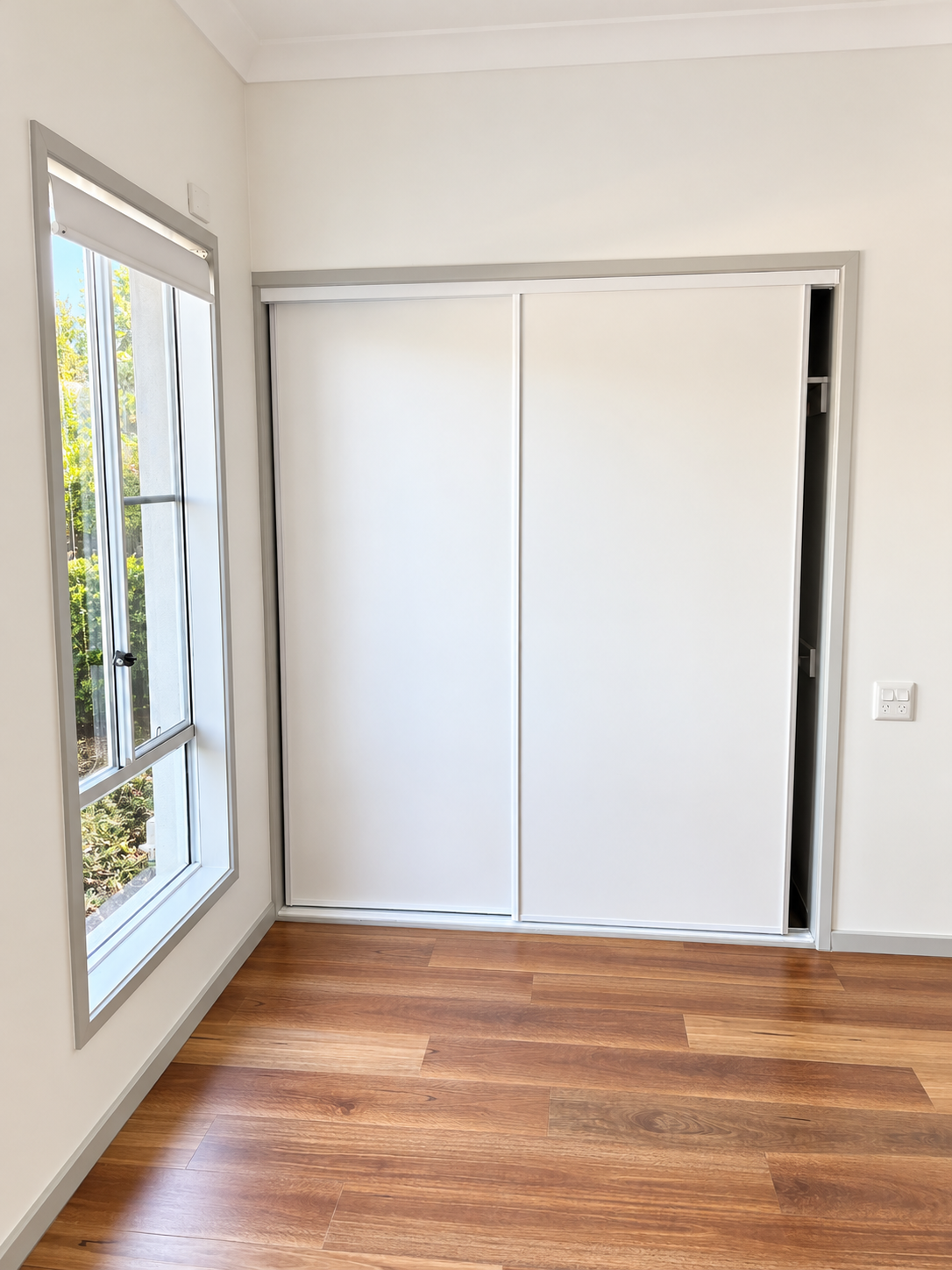 Bright Minimalist Bedroom Closet Interior.png