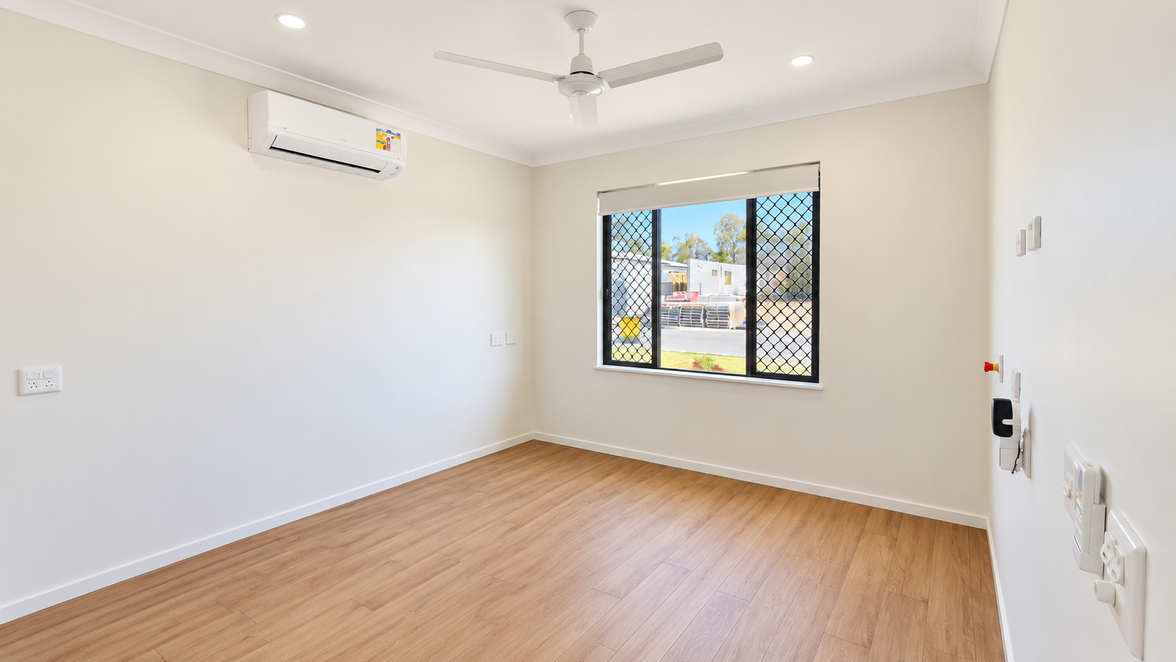 Bright Minimalist Room with Garden View.png