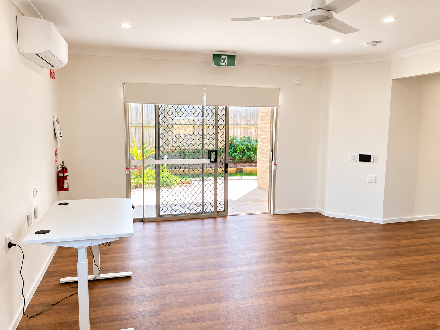 Bright Minimalist Office with Patio View.png