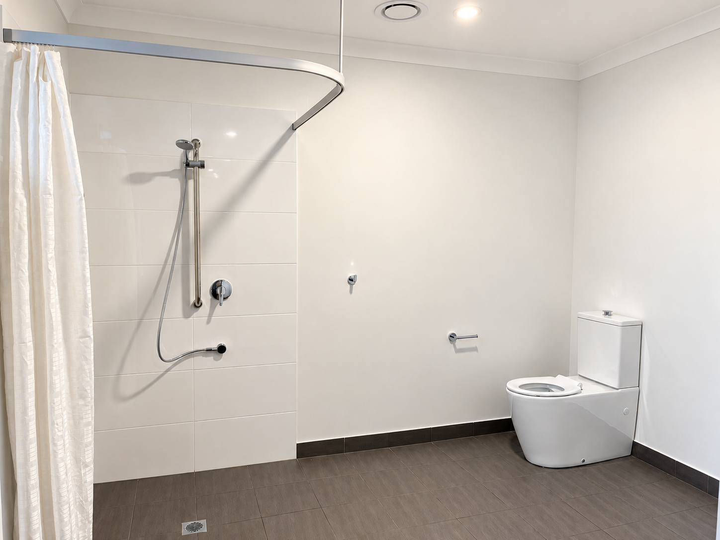 Bright Accessible Bathroom with Walk-In Shower.png