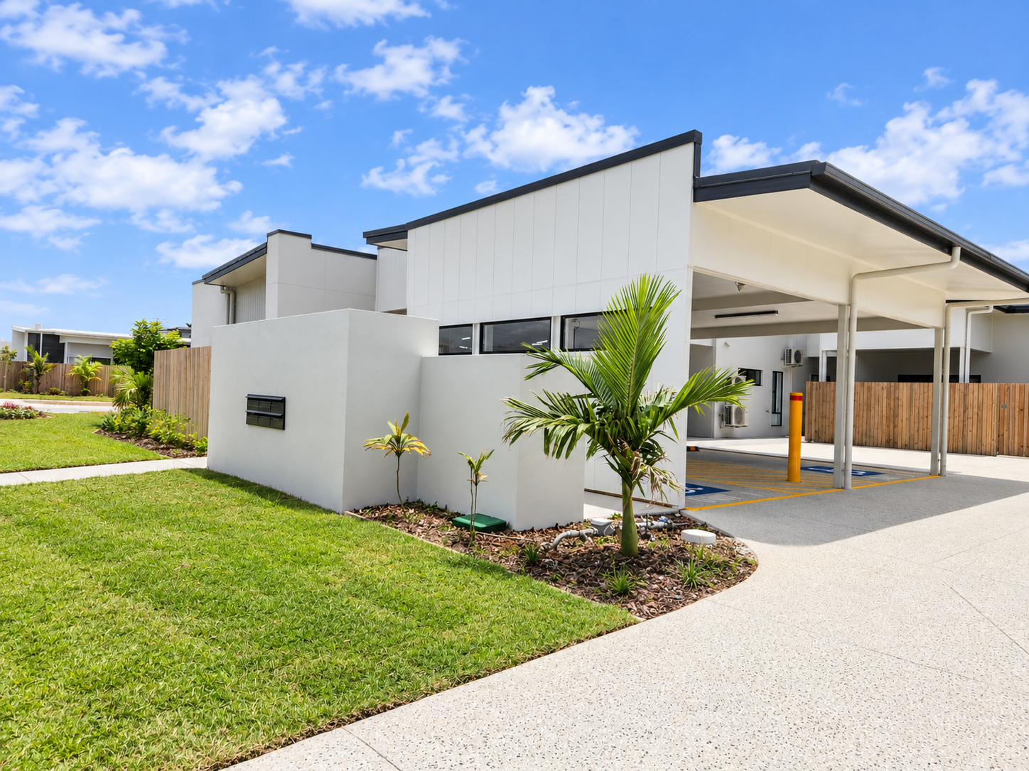 Modern Home with Tropical Landscaping.png