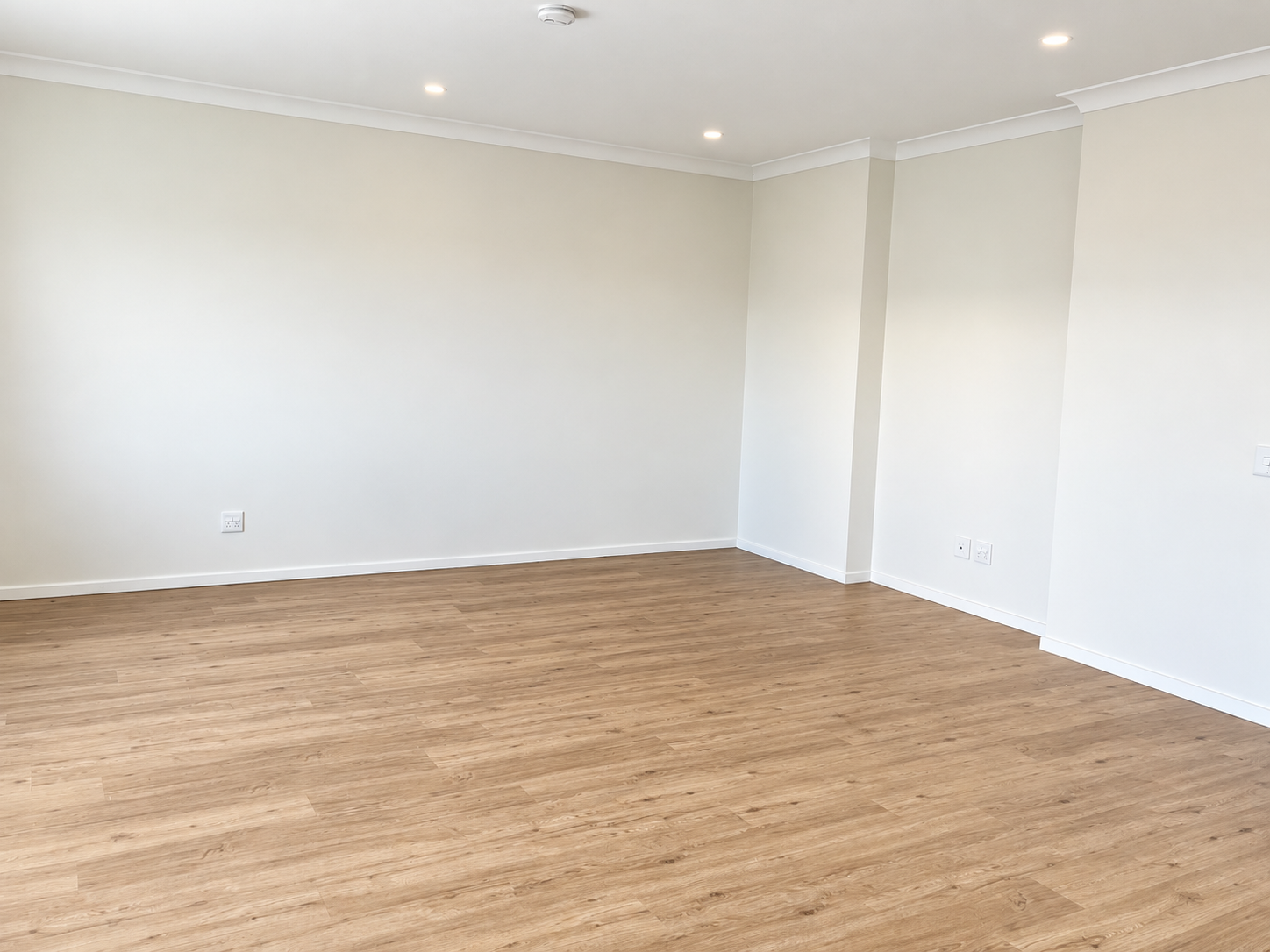Bright Minimalist Empty Living Room.png