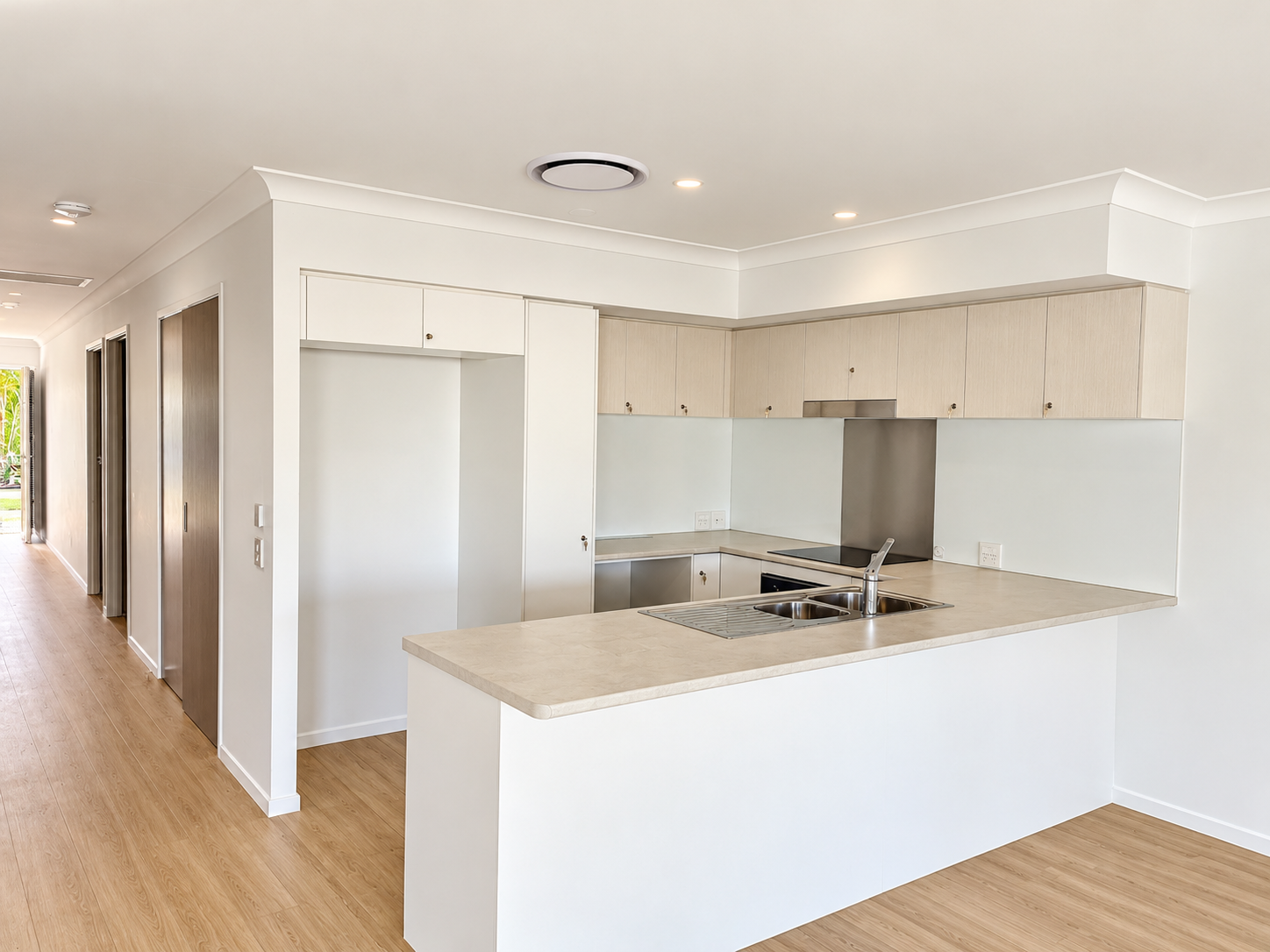 Bright Modern Kitchen and Hallway.png
