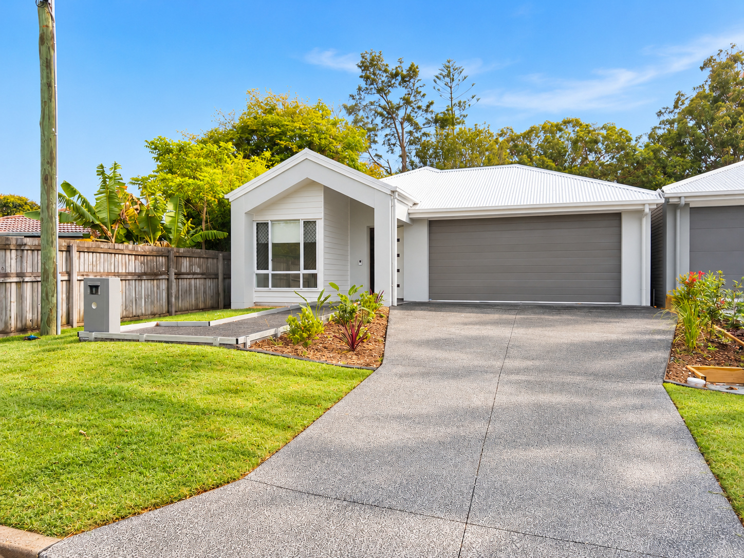 Modern Home with Wide Driveway.png