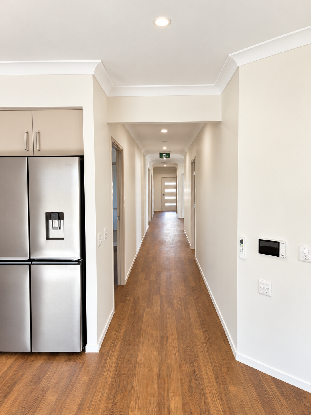 Bright Modern Hallway with Frosted Door.png