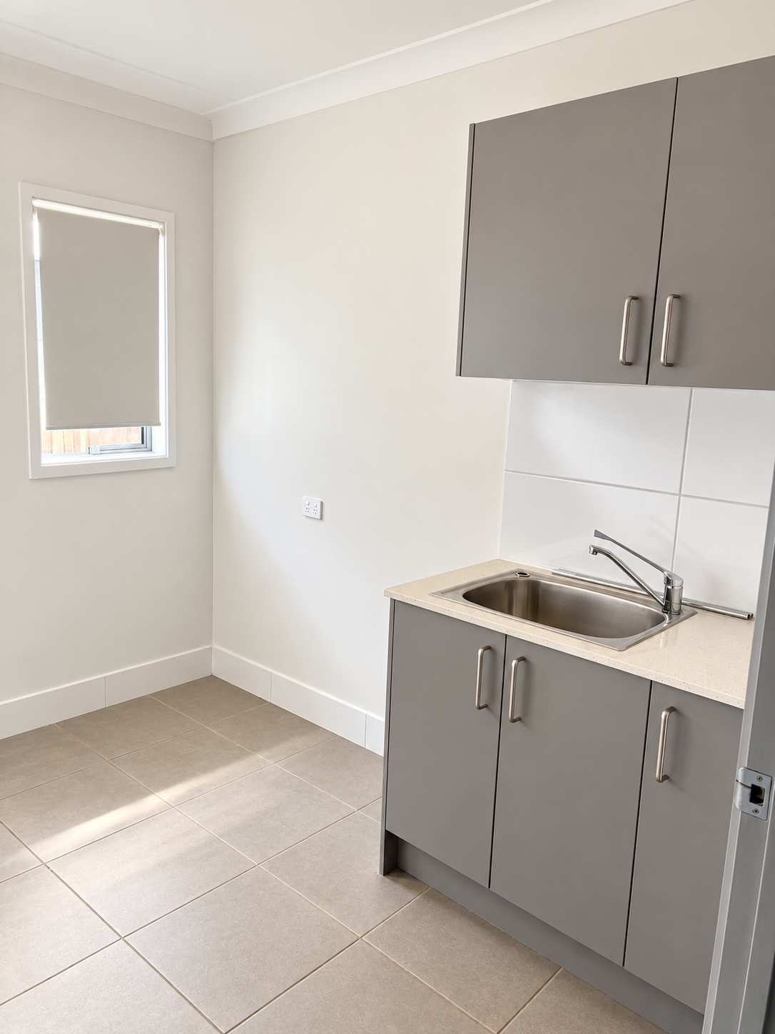 Bright Minimalist Gray Cabinet Utility Room.png