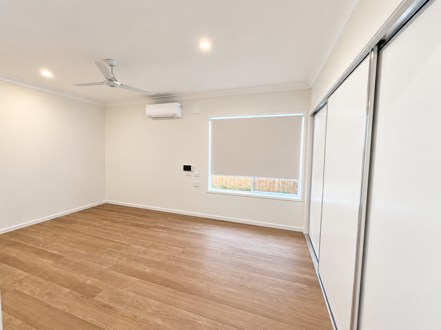 Bright Minimalist Bedroom Interior (1).png