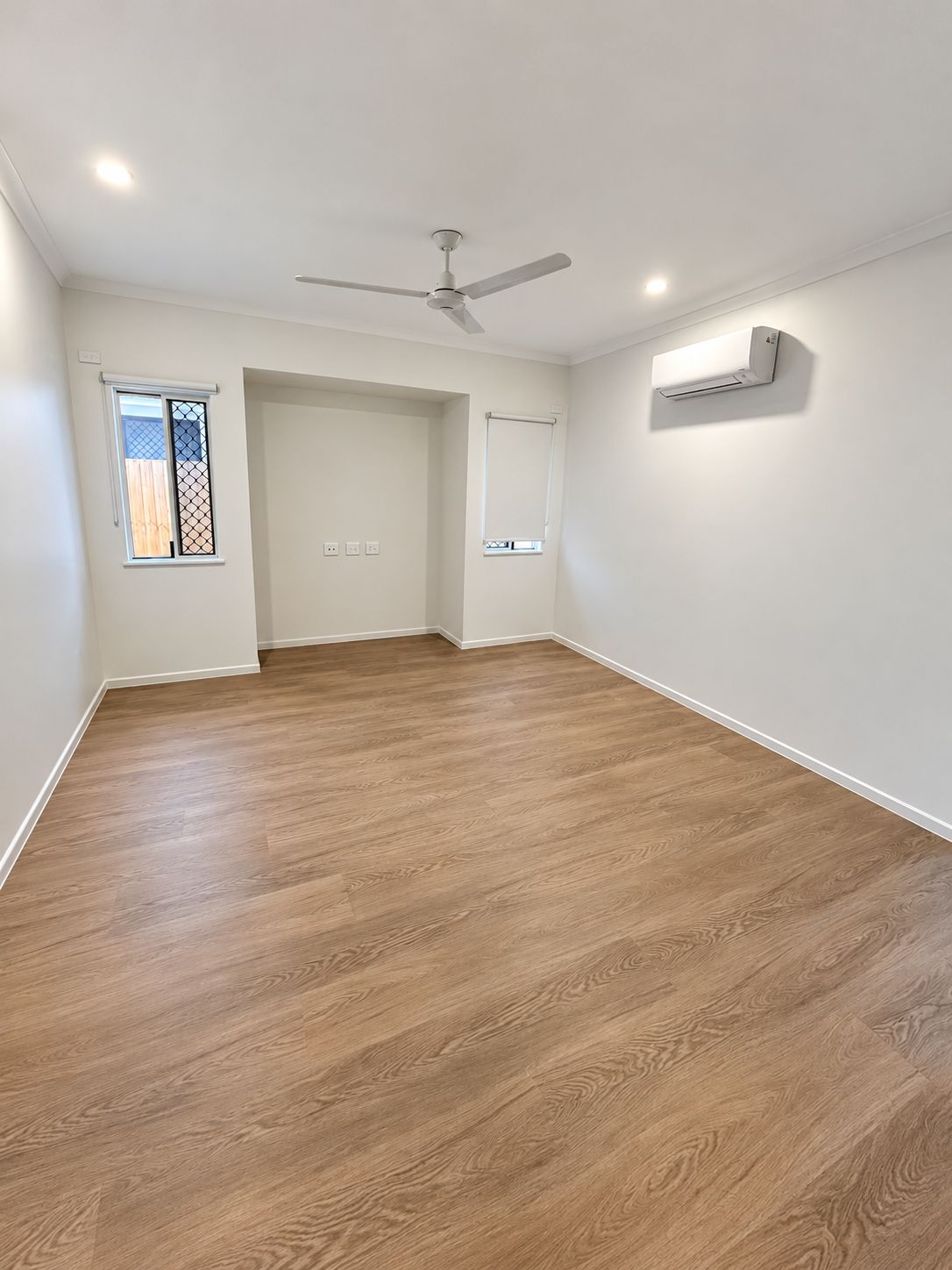 Bright Minimal Room with Ceiling Fan.png