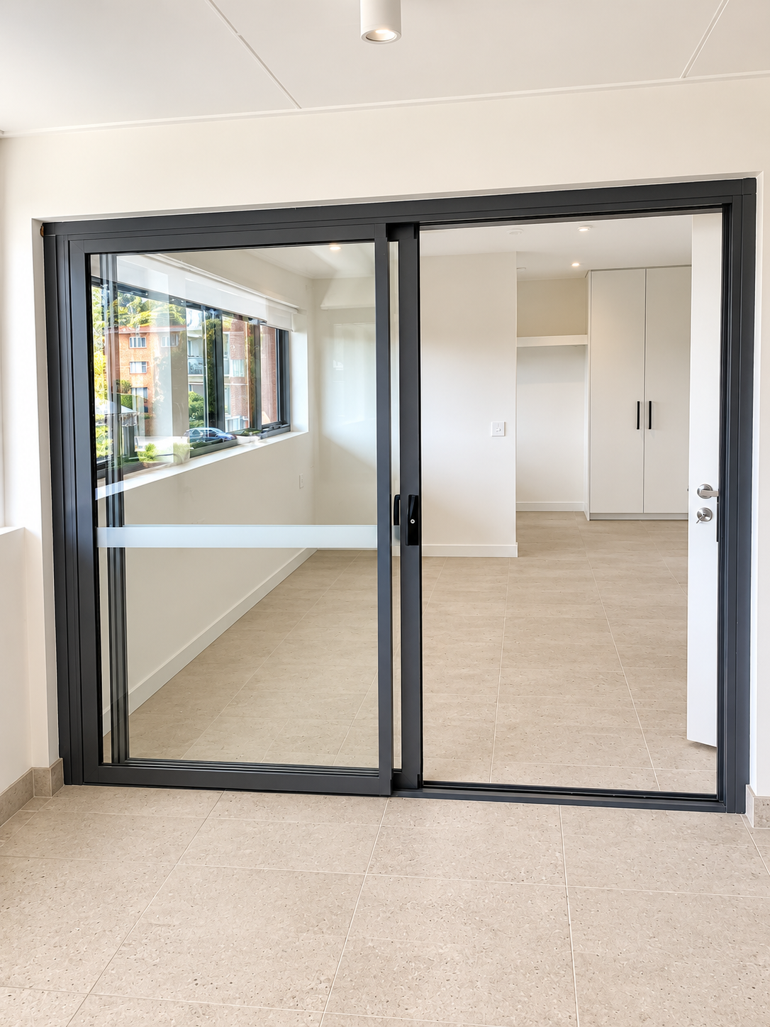 Bright Modern Interior with Sliding Glass Doors.png