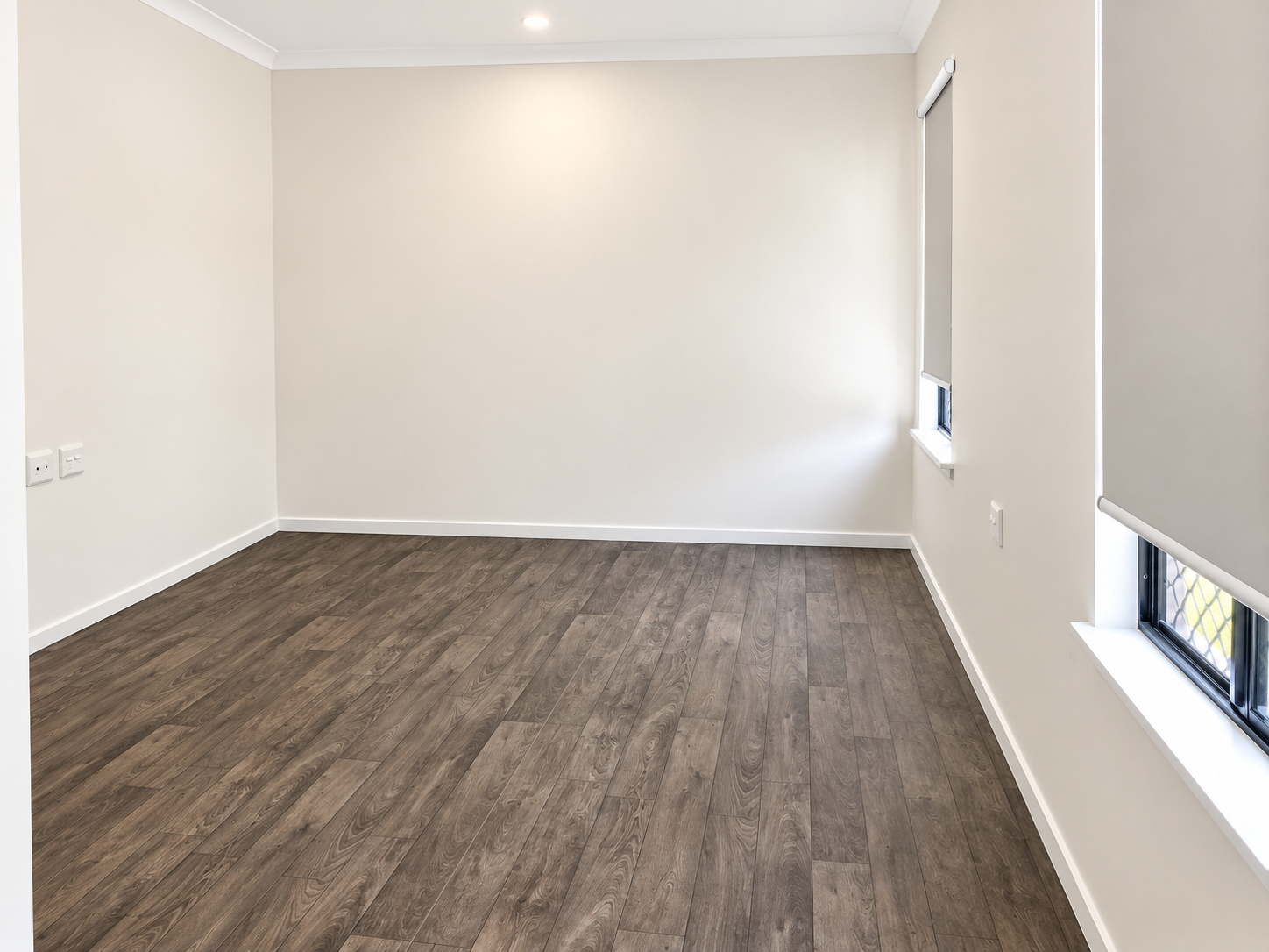 Bright Minimalist Room with Window Blinds.png
