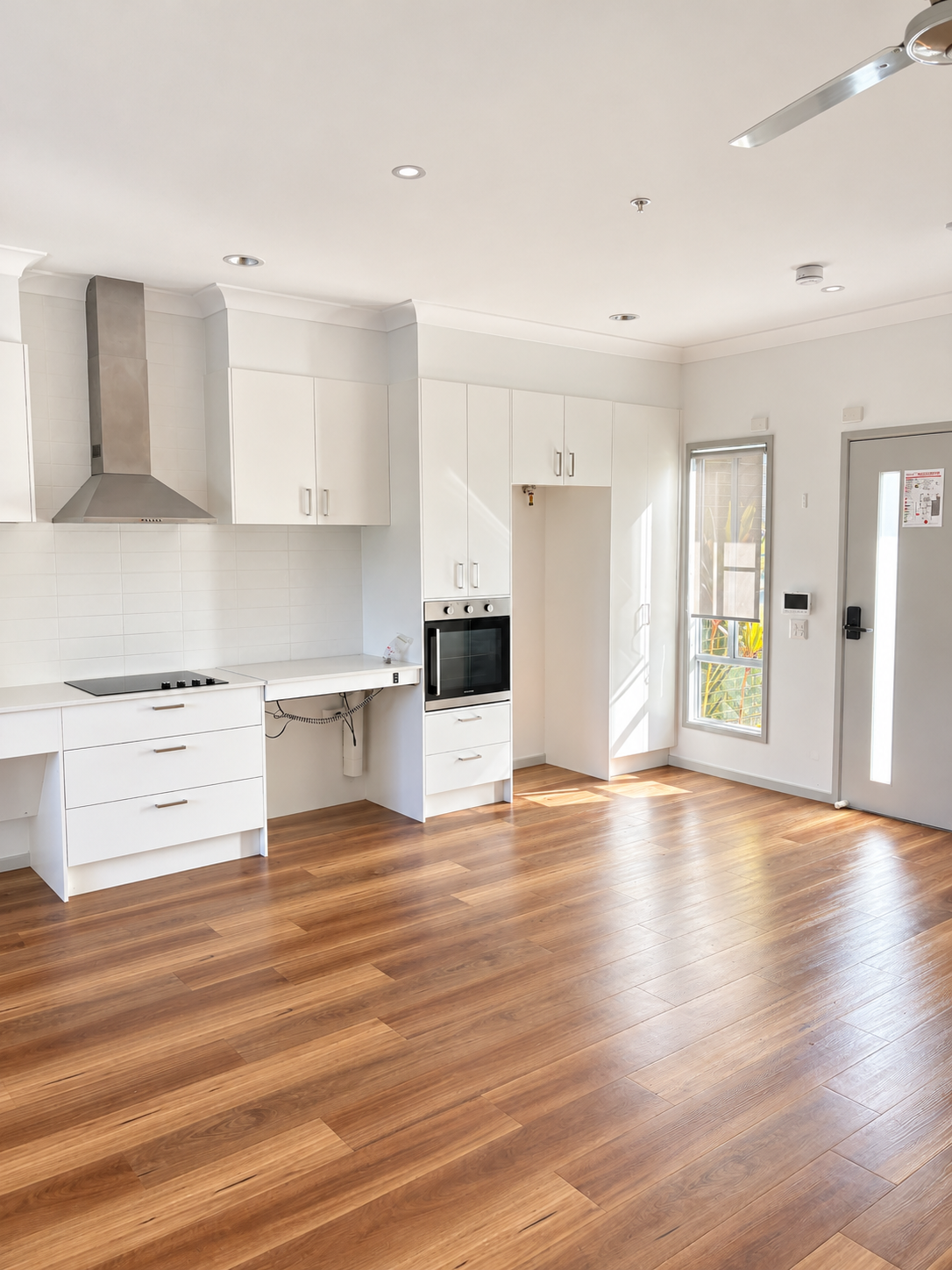 Bright Modern Open-Plan Kitchen Interior.png