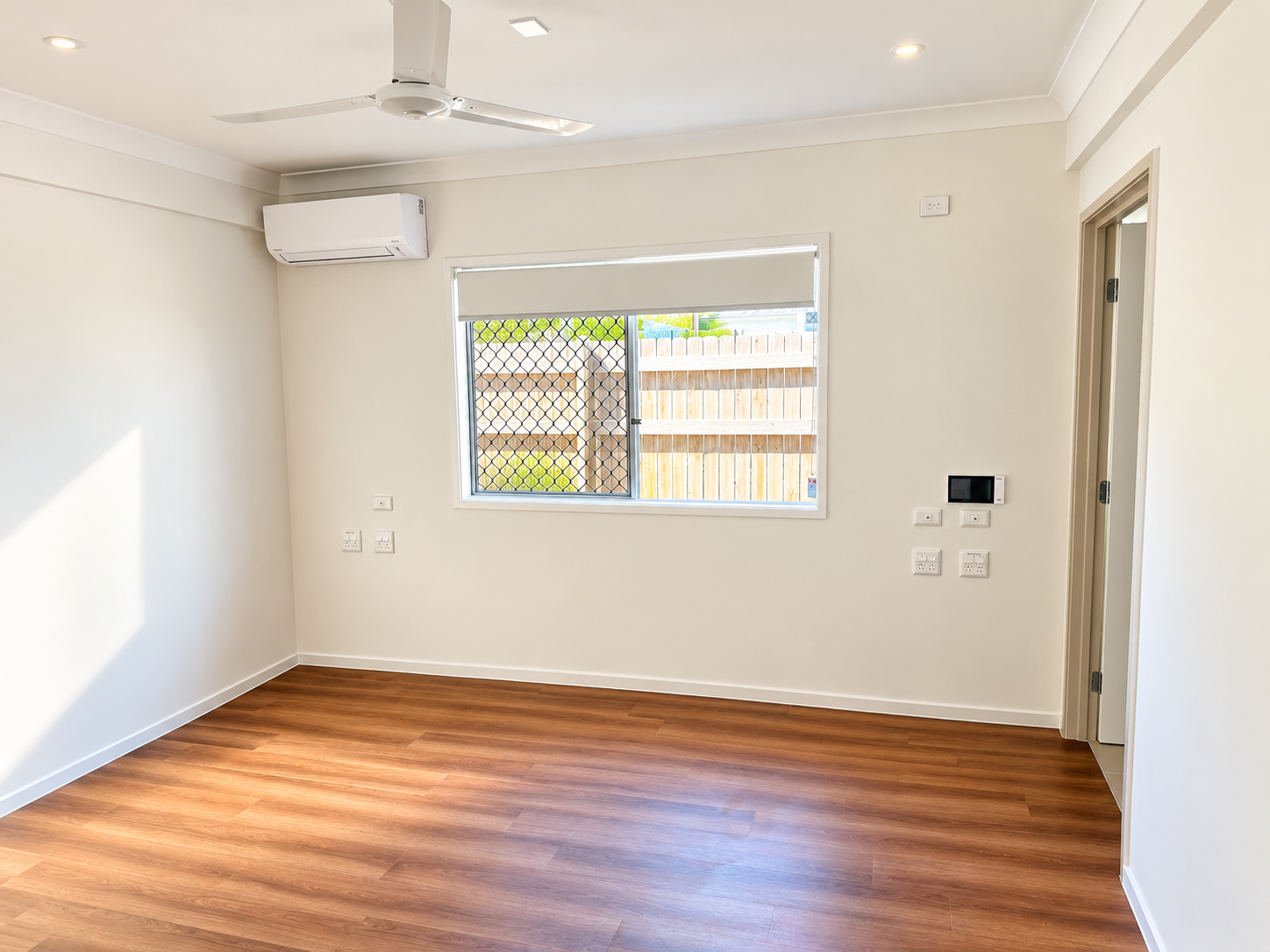 Sunlit Modern Empty Bedroom.png