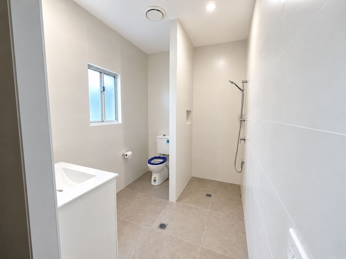 Bright Minimalist Walk-In Shower Bathroom.png