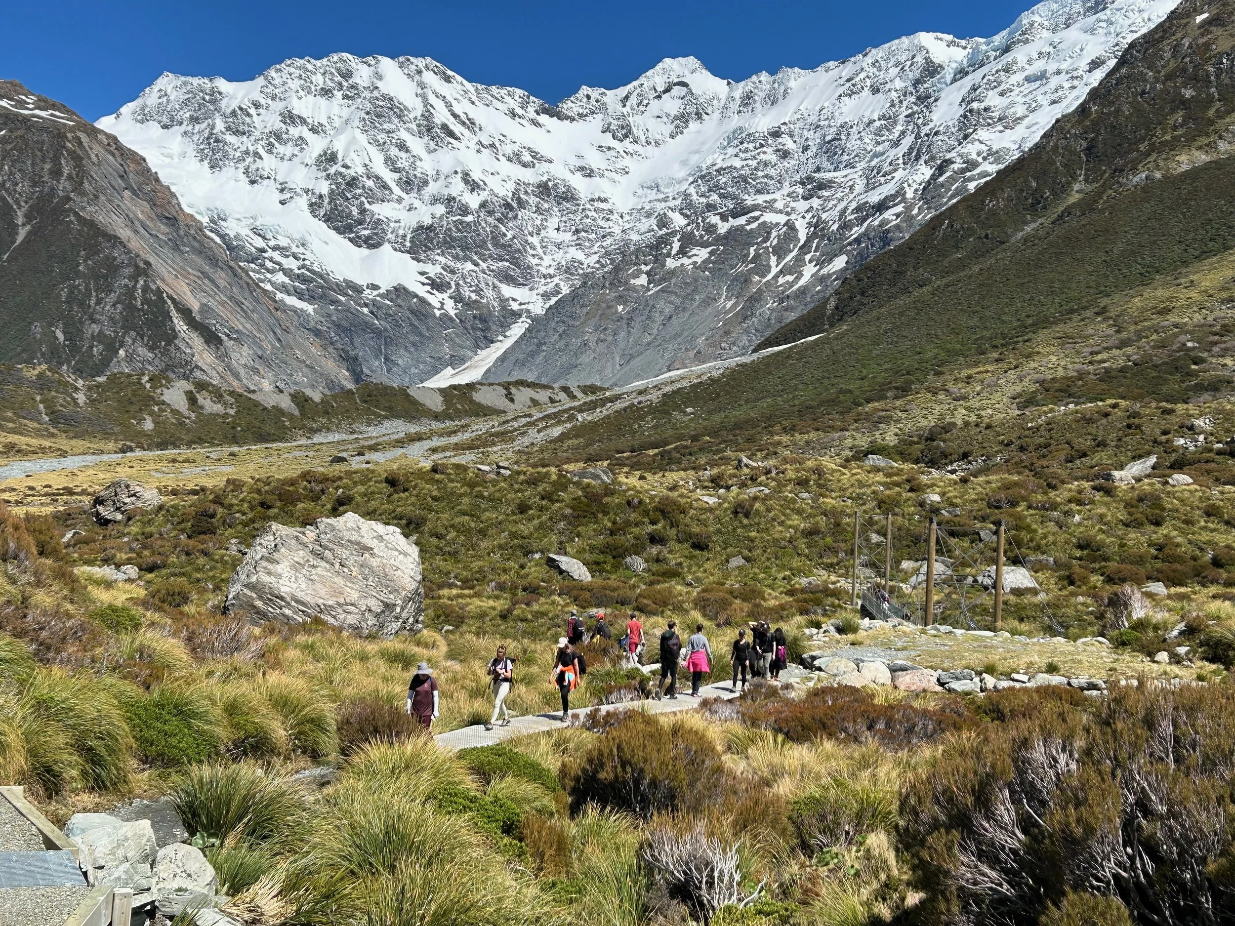 Hikers walking on the Hooker Valley track in Mt Cook